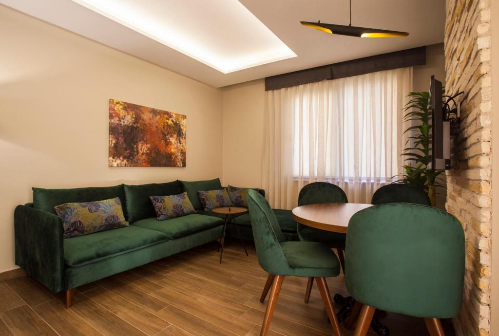 Posezení v ubytování Maxuite Hotel in Home