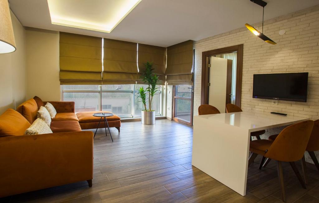 TV a/nebo společenská místnost v ubytování Maxuite Hotel in Home