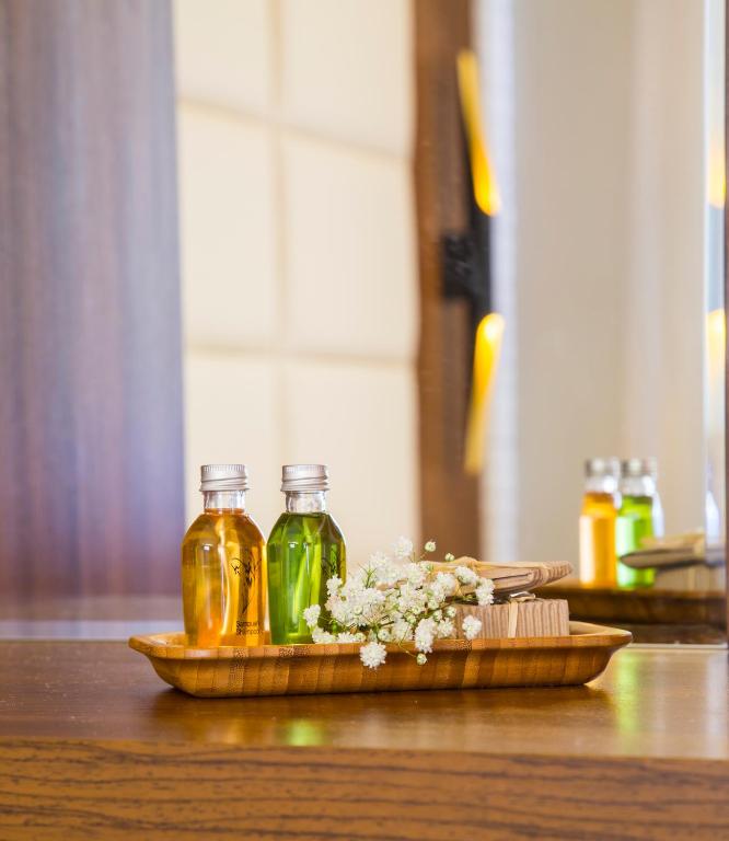 Nápoje v ubytování Maxuite Hotel in Home