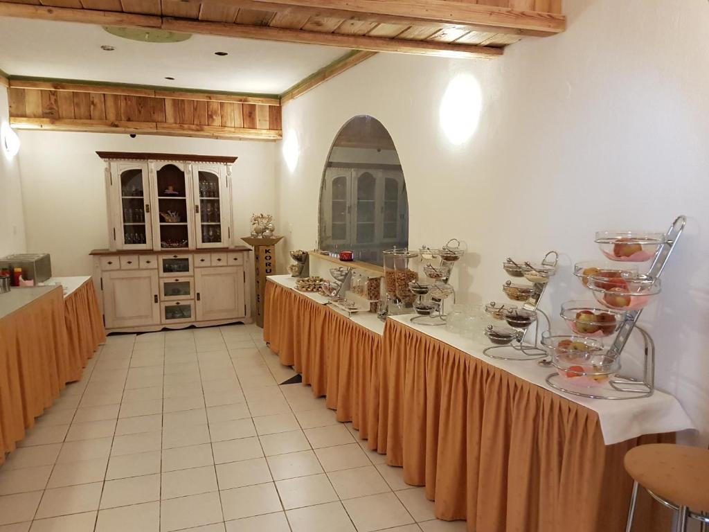 Kuchyň nebo kuchyňský kout v ubytování Hotel Koruna