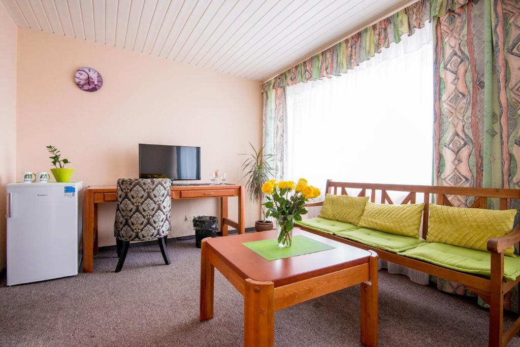 TV a/nebo společenská místnost v ubytování Hotel Mezaparks