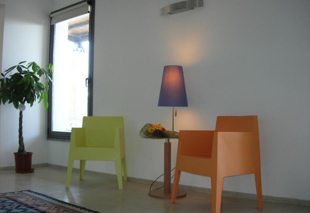 Posezení v ubytování Le Saline Hotel