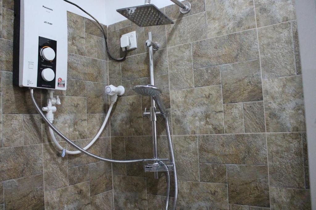 Koupelna v ubytování Alex Home Stay