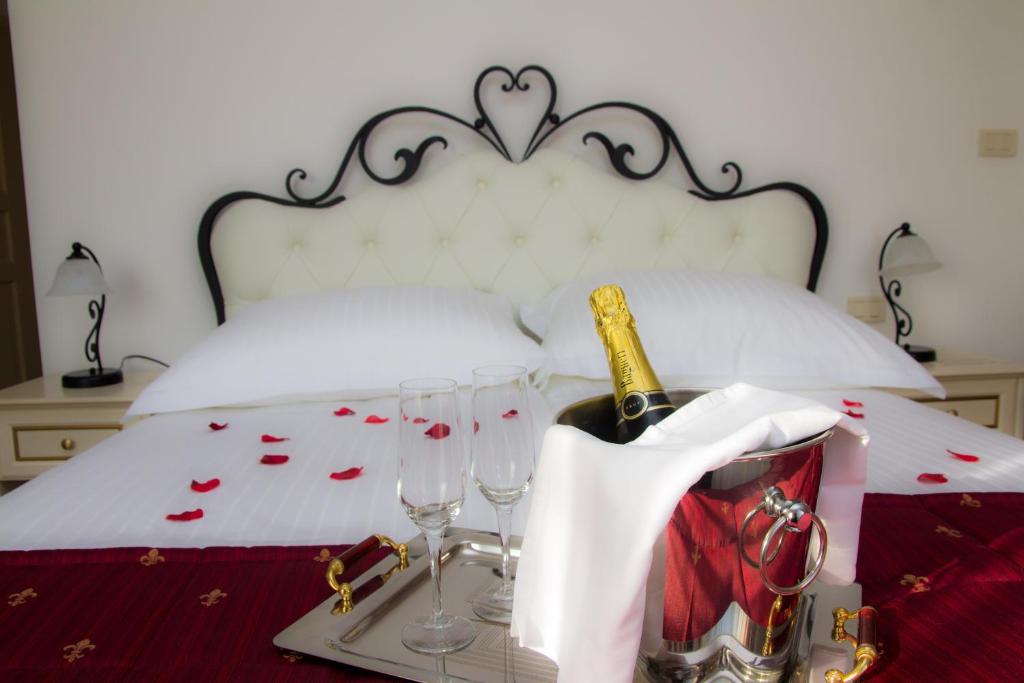 Postel nebo postele na pokoji v ubytování Guest House Šterk