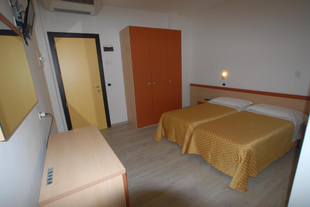 Postel nebo postele na pokoji v ubytování Hotel Tilmar