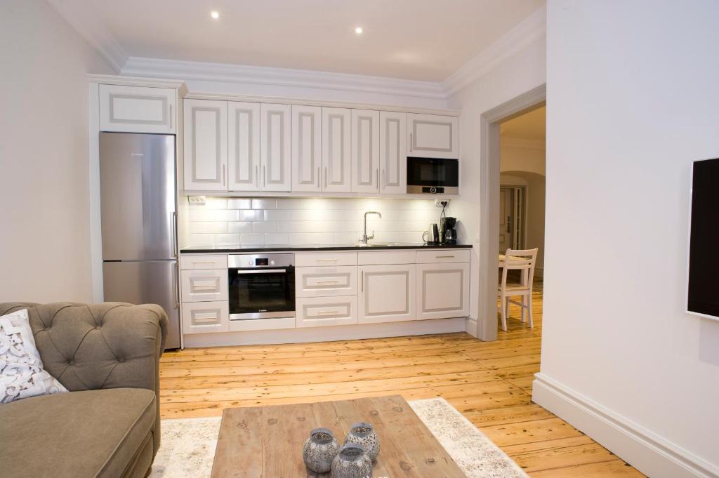 Kuchyň nebo kuchyňský kout v ubytování Residence Perseus