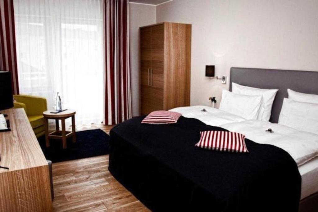 Postel nebo postele na pokoji v ubytování Hotel Palatina "Hotel-Restaurant"