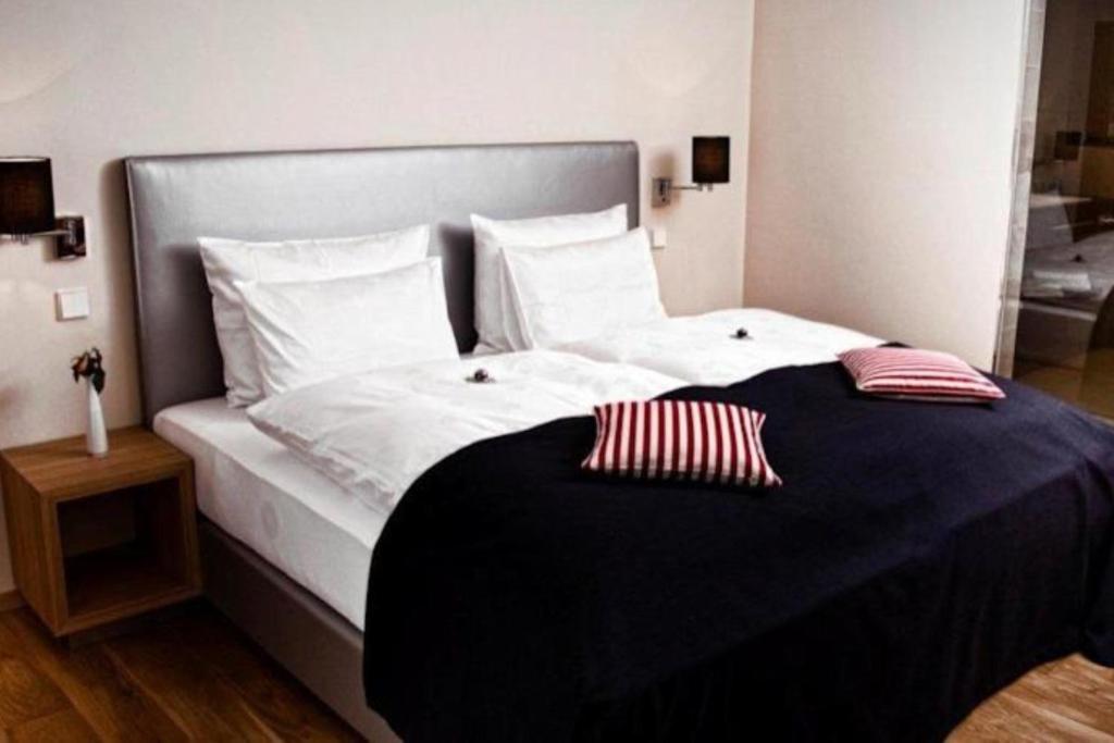 Postel nebo postele na pokoji v ubytování Hotel Palatina "Hotel-Restaurant"