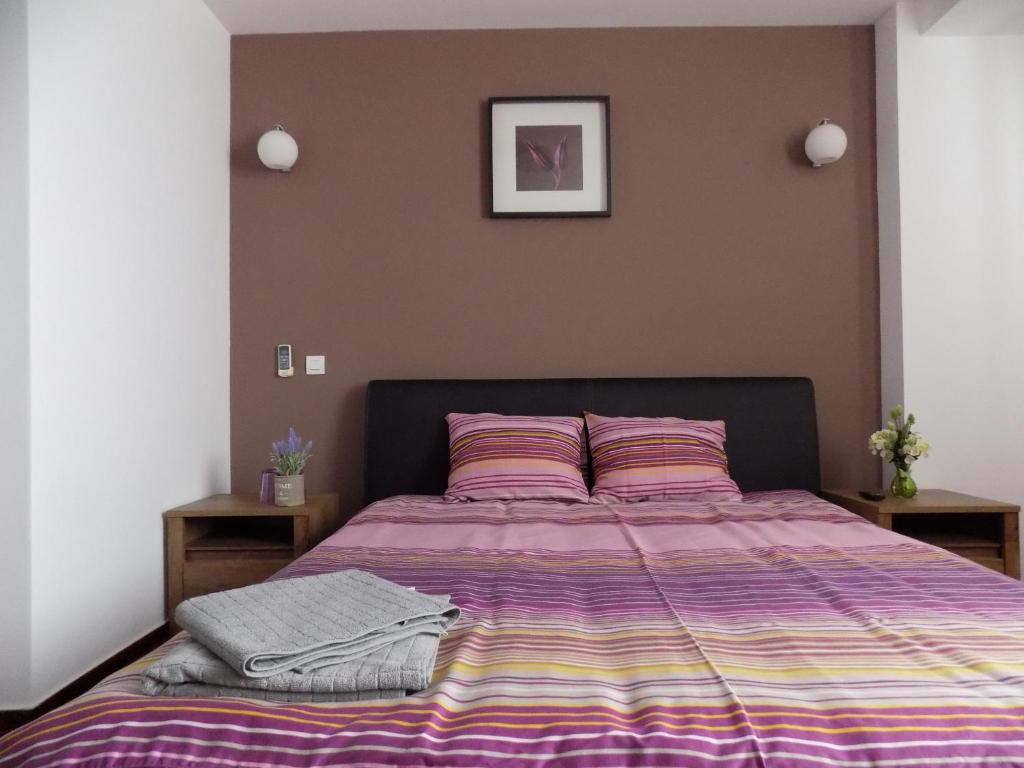 Postel nebo postele na pokoji v ubytování Colosseum Residence