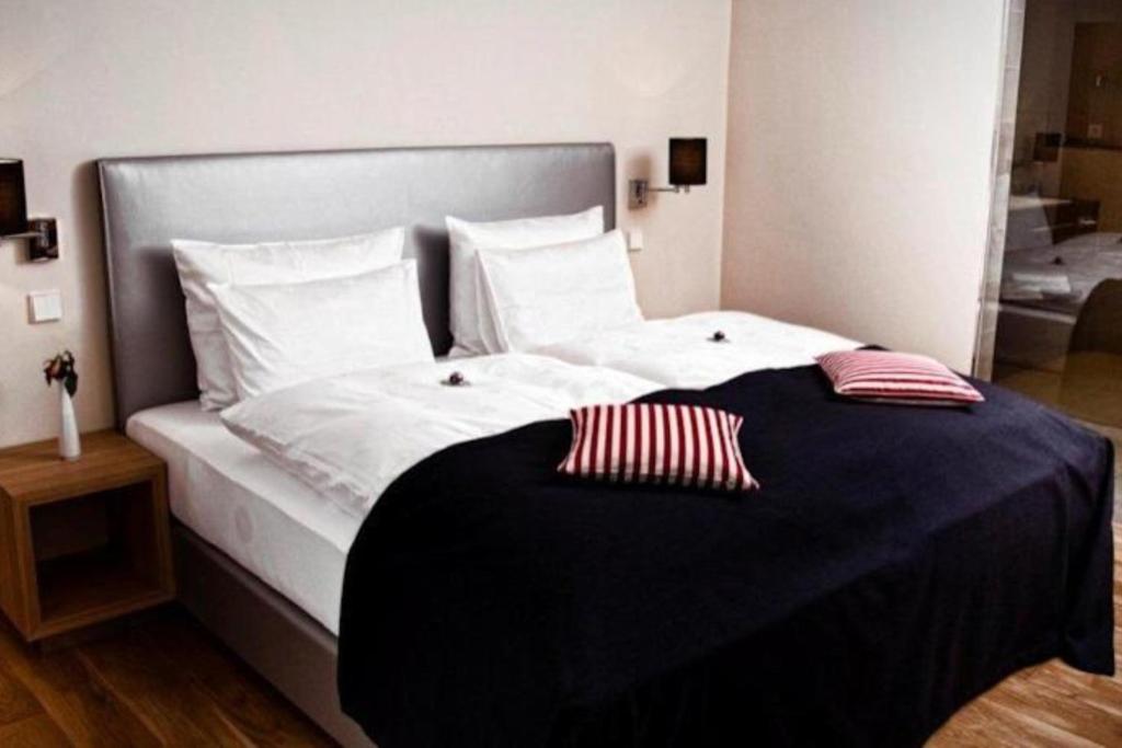 Postel nebo postele na pokoji v ubytování Hotel Palatina "Hotel-Restaurant"
