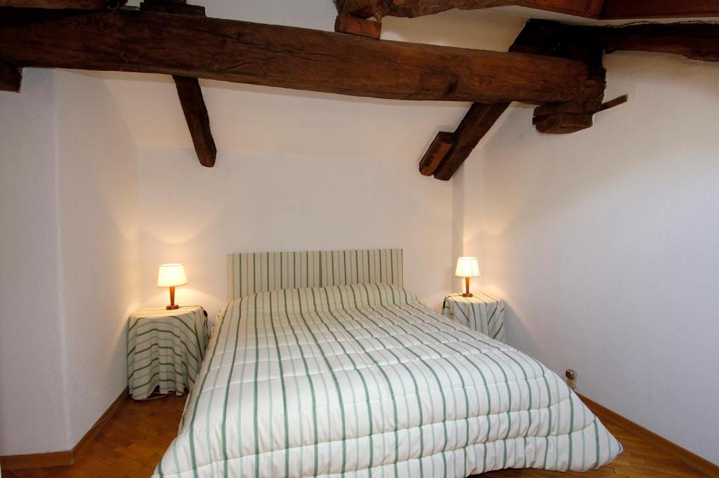 Łóżko lub łóżka w pokoju w obiekcie Agriturismo Il Torrione
