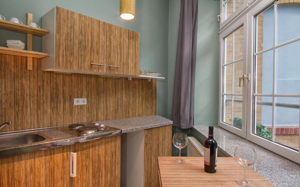 Kuchyň nebo kuchyňský kout v ubytování Singer109 Hostel, Hotel & Apartment