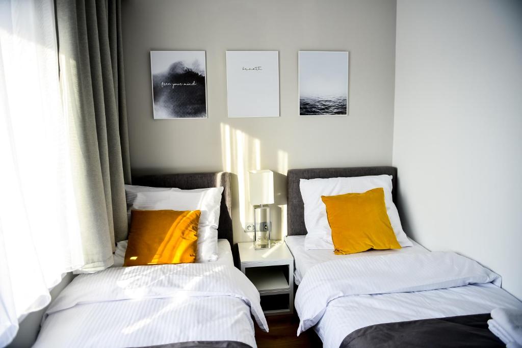Postel nebo postele na pokoji v ubytování Hotel Coliber