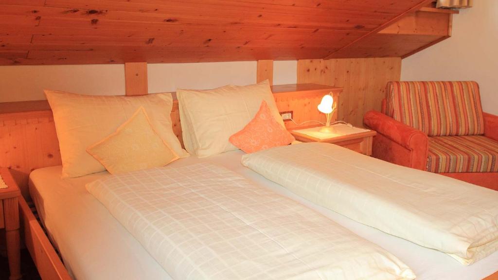 Postel nebo postele na pokoji v ubytování Bed and Breakfast Iman
