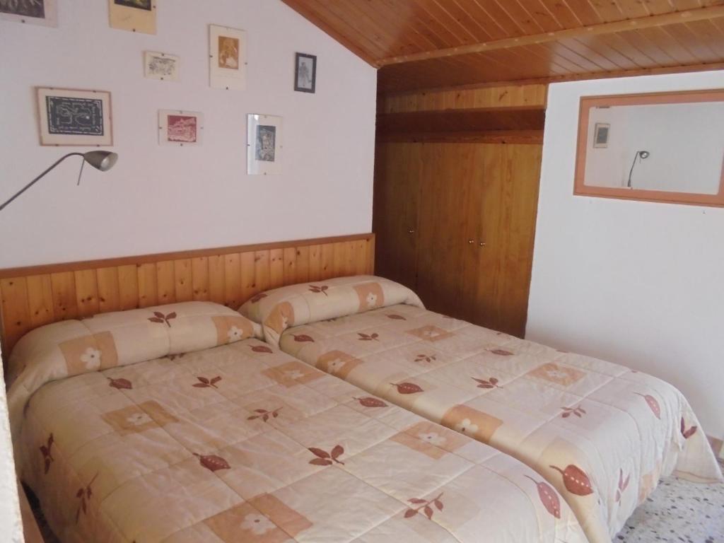 Postel nebo postele na pokoji v ubytování Ca la Viola