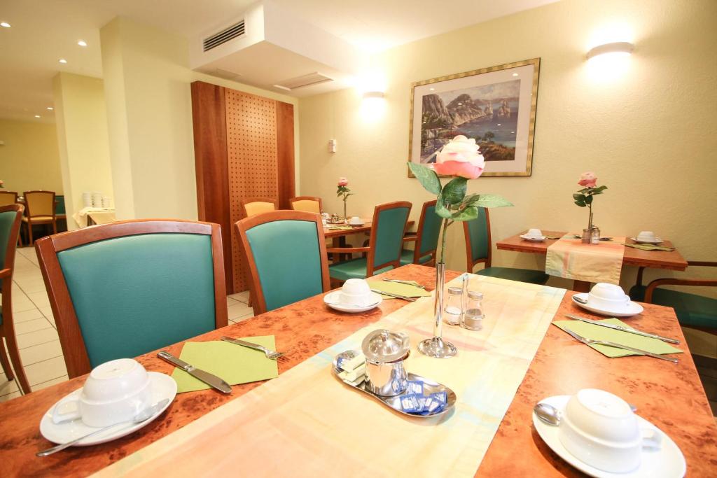 Uma área de estar em Hotel Miramar am Römer