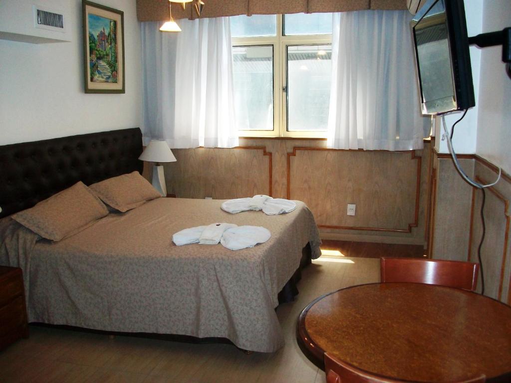 Postel nebo postele na pokoji v ubytování Village Garden Apart Hotel