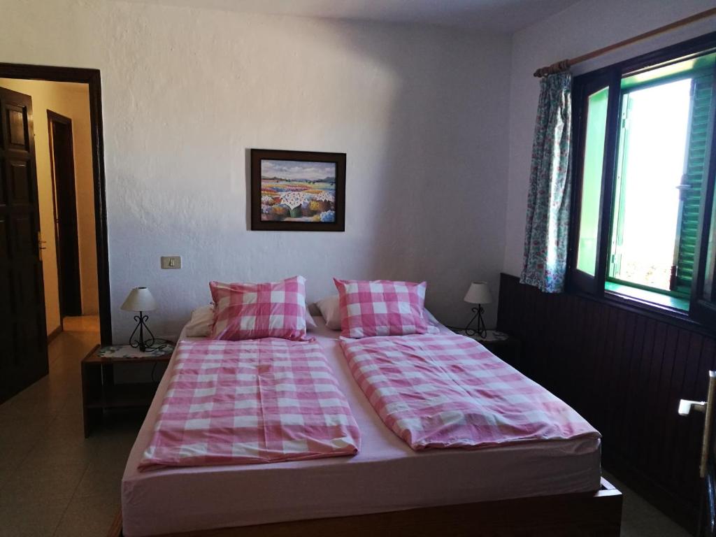 Postel nebo postele na pokoji v ubytování Apartments Finca El Rincón