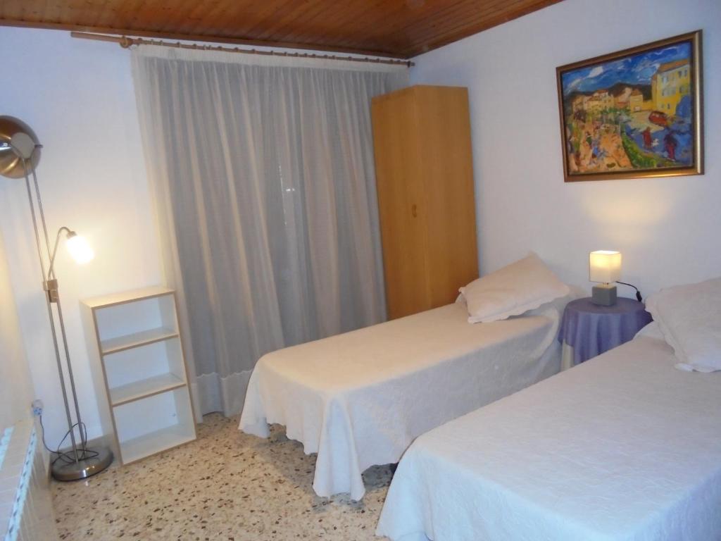 Postel nebo postele na pokoji v ubytování Ca la Viola