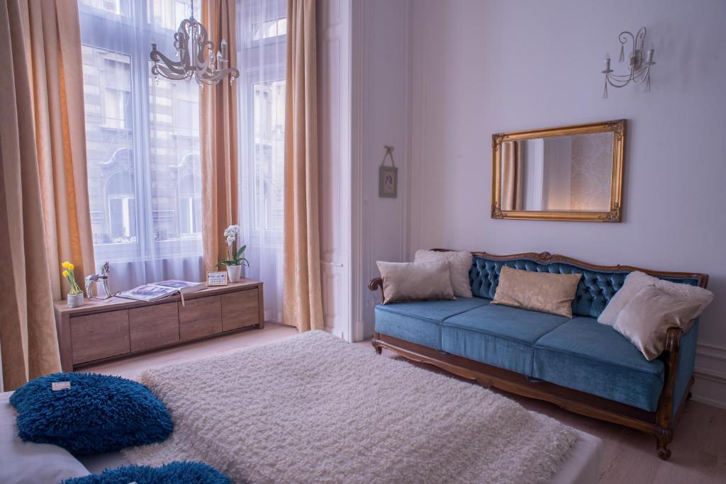 Postel nebo postele na pokoji v ubytování Bella DeLux Apartment