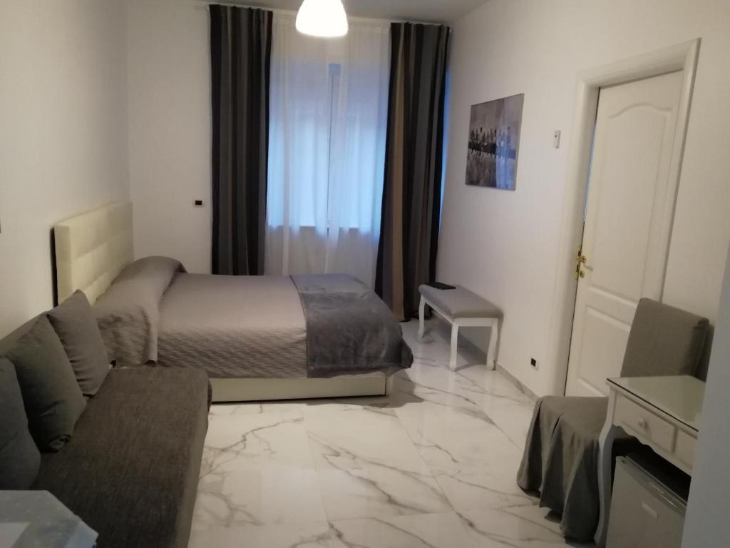Postel nebo postele na pokoji v ubytování B&B Casa Nizza