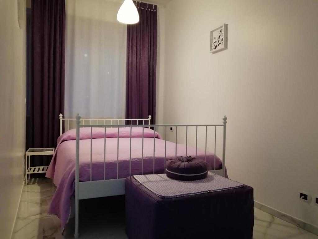 Postel nebo postele na pokoji v ubytování B&B Casa Nizza