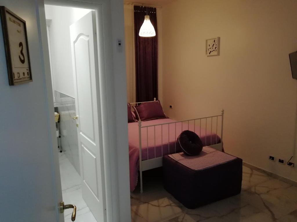 Postel nebo postele na pokoji v ubytování B&B Casa Nizza