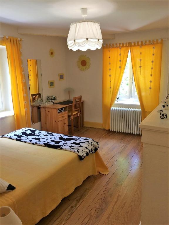 Poste&#x13E; alebo postele v izbe v ubytovan&iacute; La Maison du Parc