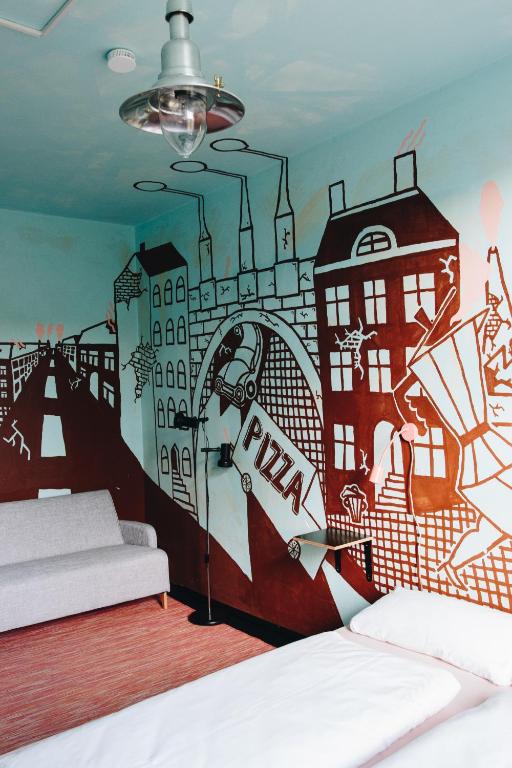 Postel nebo postele na pokoji v ubytování Hostel & Garten Eden