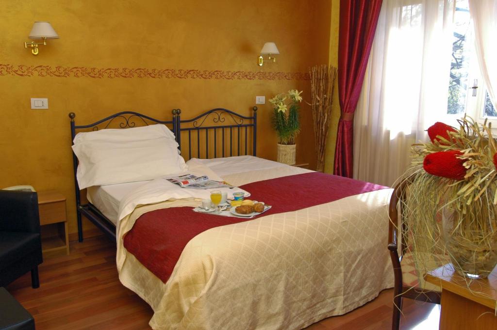 Postel nebo postele na pokoji v ubytování Park Hotel