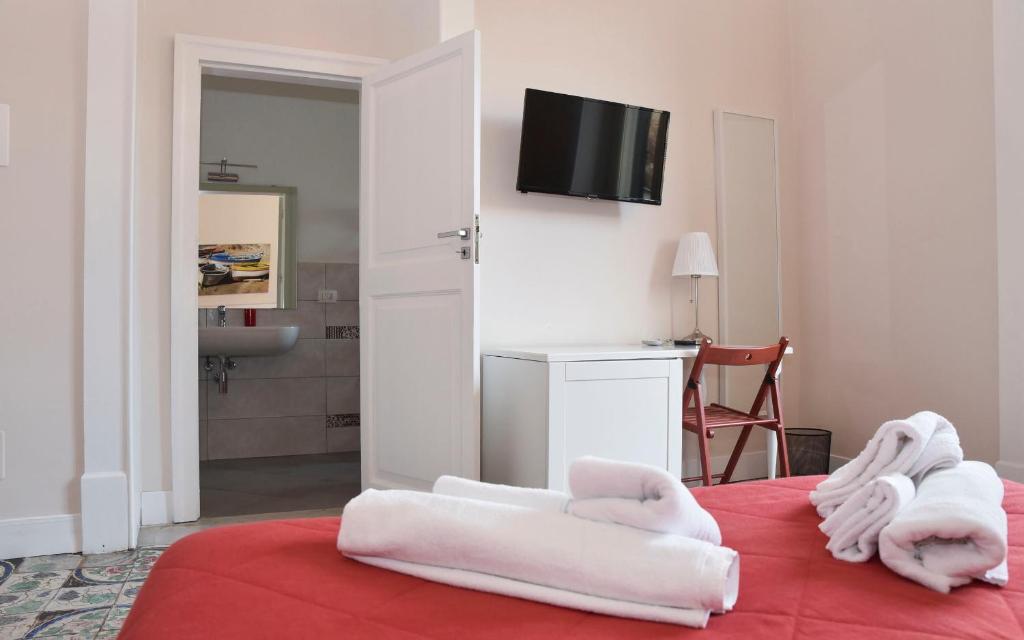 Posteľ alebo postele v izbe v ubytovaní Alta Marea B&B