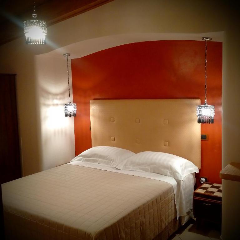 Łóżko lub łóżka w pokoju w obiekcie Bed & Breakfast De Nittis