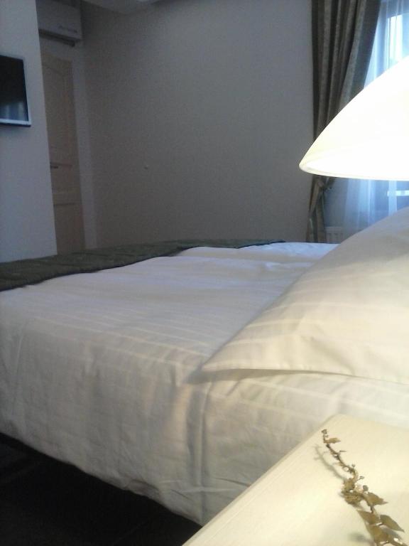 Postel nebo postele na pokoji v ubytování Guest House Šterk