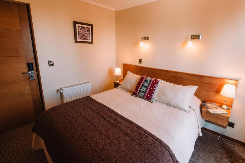 Uma cama ou camas num quarto em Hotel Chalet Valluga