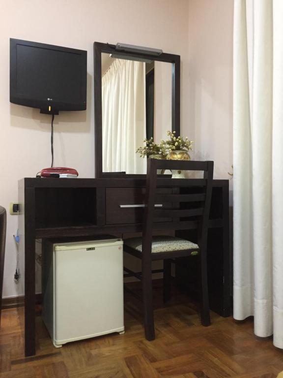 TV a/nebo společenská místnost v ubytování Hotel Colombo Elbasan