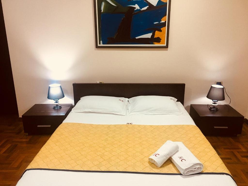 Postel nebo postele na pokoji v ubytování Hotel Colombo Elbasan