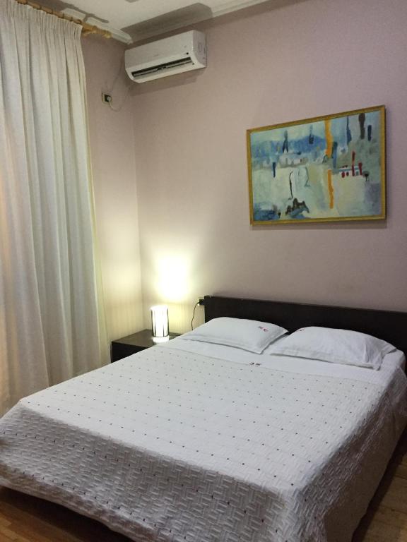 Postel nebo postele na pokoji v ubytování Hotel Colombo Elbasan
