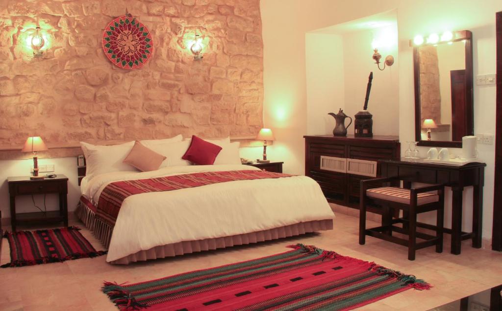 Postel nebo postele na pokoji v ubytování Hayat Zaman Hotel And Resort Petra