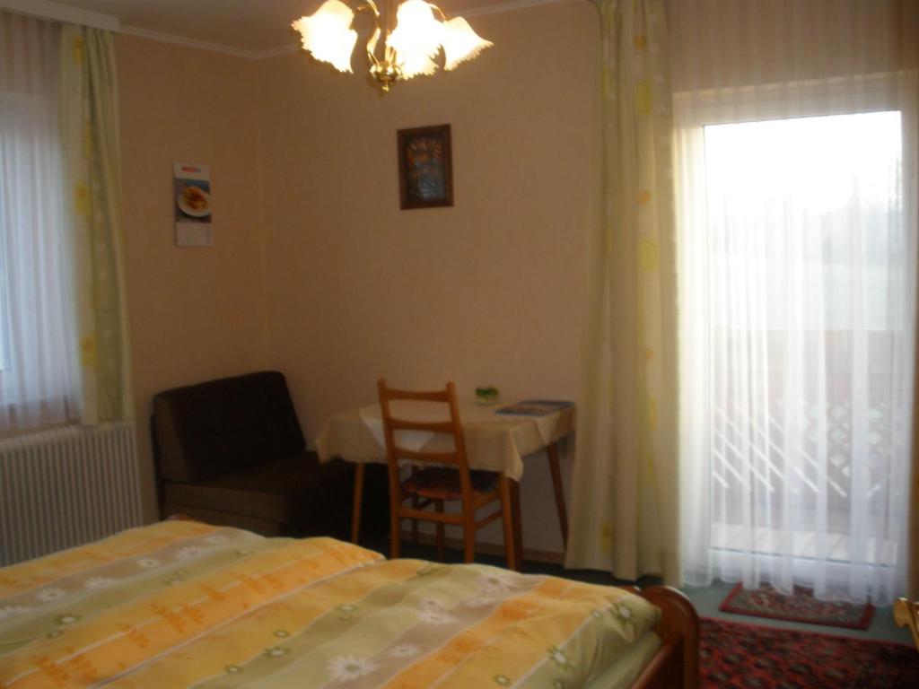 Postel nebo postele na pokoji v ubytování Haus Kloibhofer