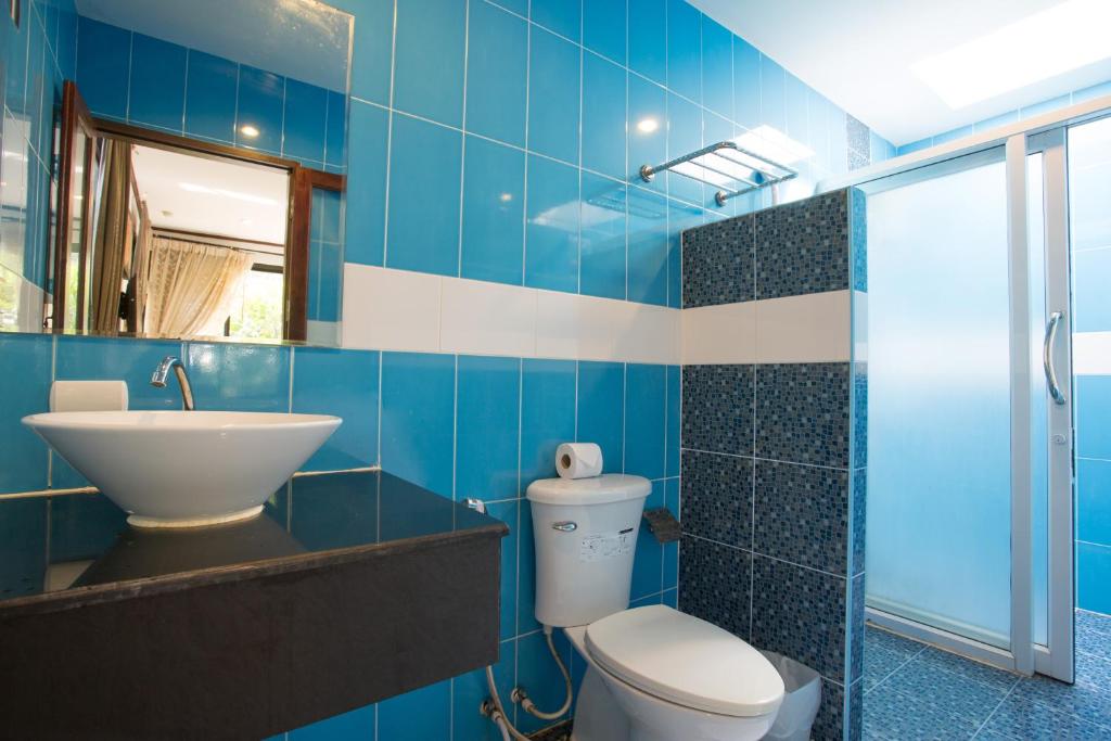 Ванная комната в PloyKhumThong Boutique Resort