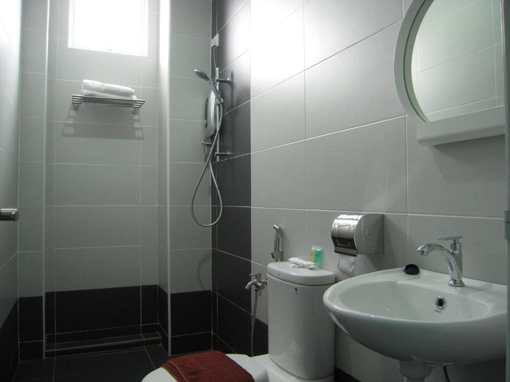 Koupelna v ubytování L Hotel