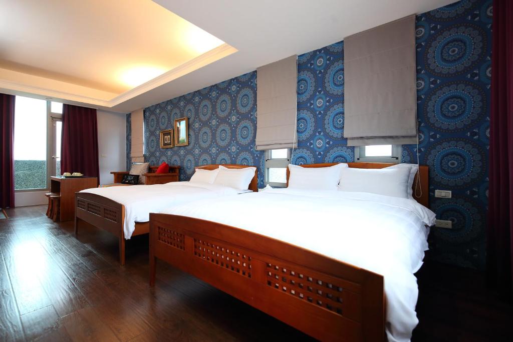 Postel nebo postele na pokoji v ubytování Pretty Sun B&B