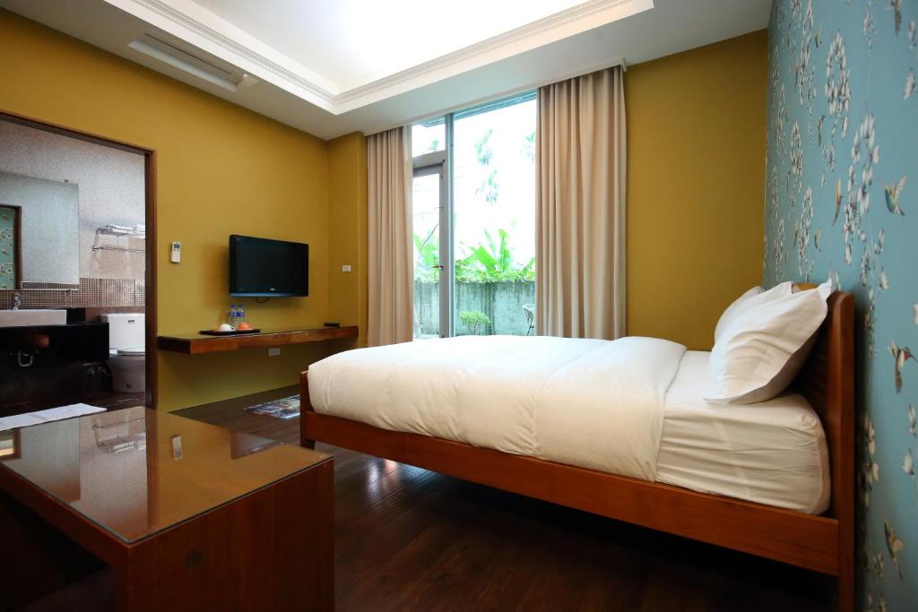 TV a/nebo společenská místnost v ubytování Pretty Sun B&B