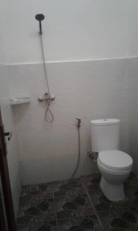 Koupelna v ubytování Madu Sentana House