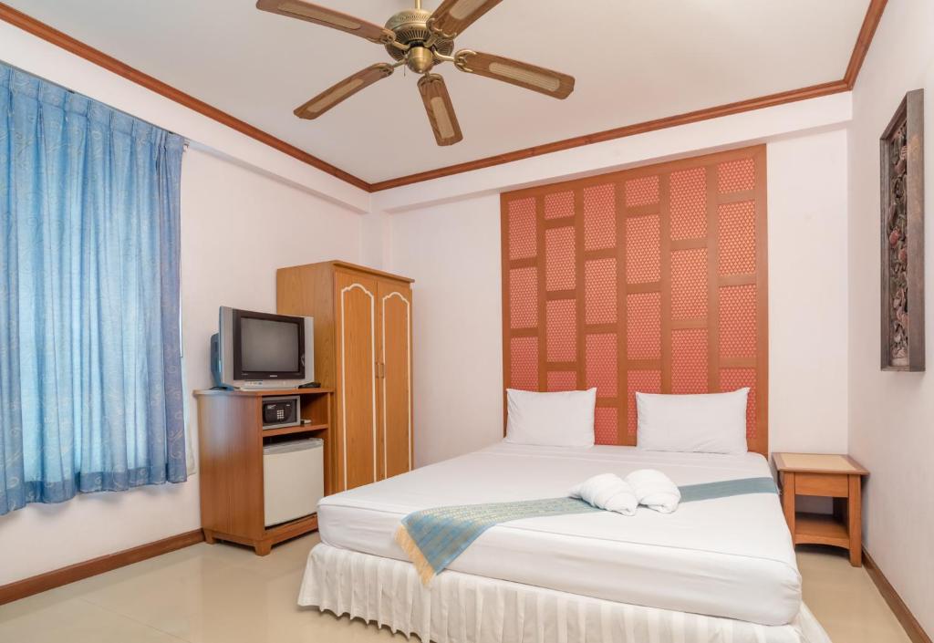 Кровать или кровати в номере New Siam III Guest House