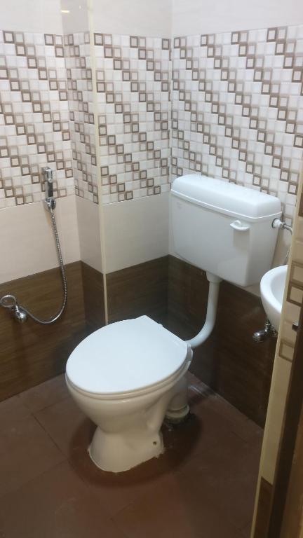 Koupelna v ubytování Hotel Sarada Nivas
