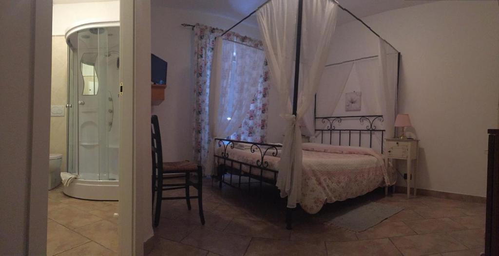 Postel nebo postele na pokoji v ubytování Il Portico
