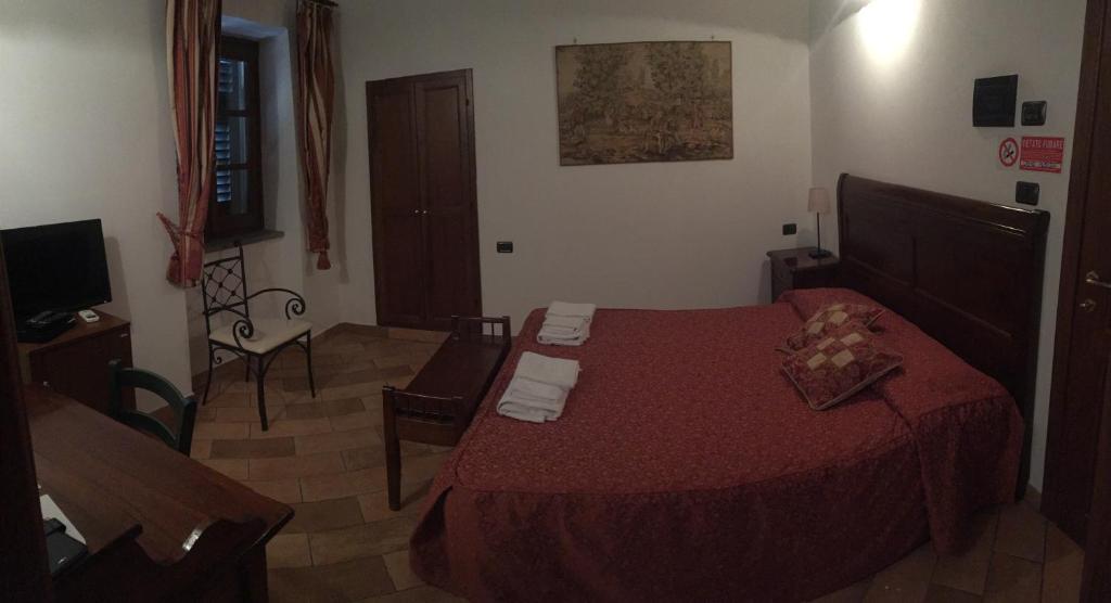 Postel nebo postele na pokoji v ubytování Il Portico