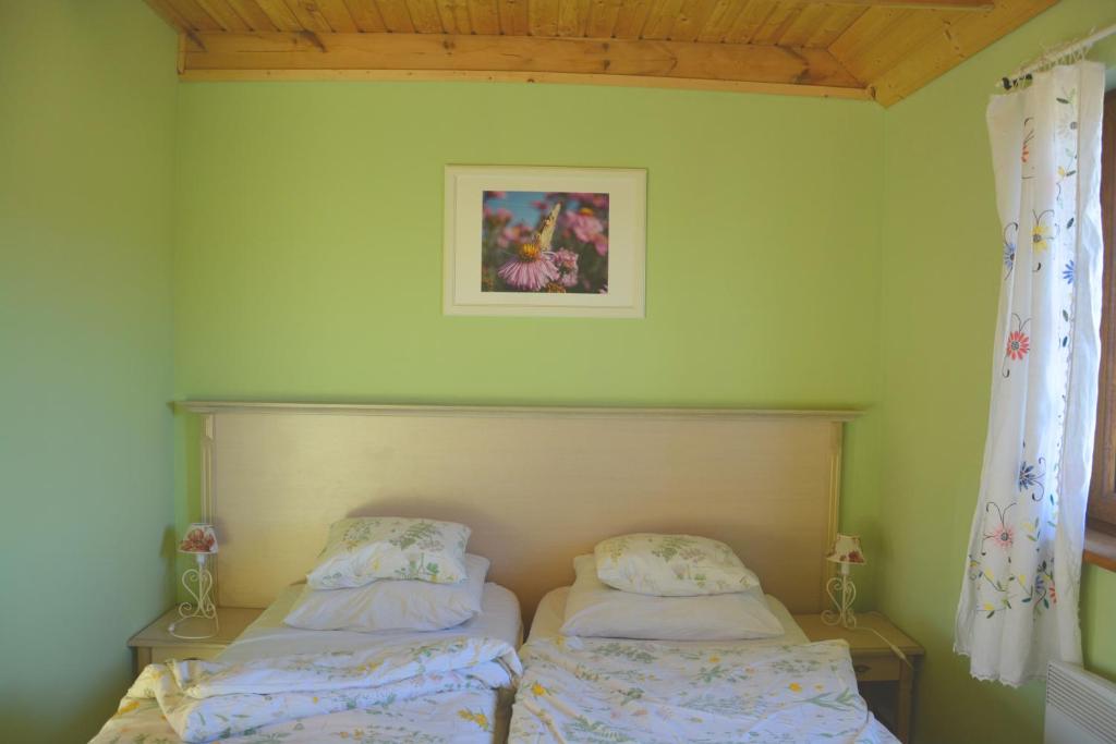 Posteľ alebo postele v izbe v ubytovaní Ranczo w Dolinie