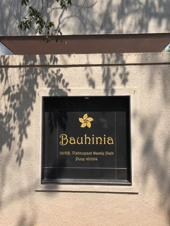 Majutusasutuses Bauhinia olev sertifikaat, autasu, silt või muu dokument